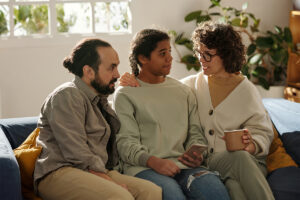 Family talks with adolescents about mental health treatment after understanding insurance coverage for adolescent residential recovery.