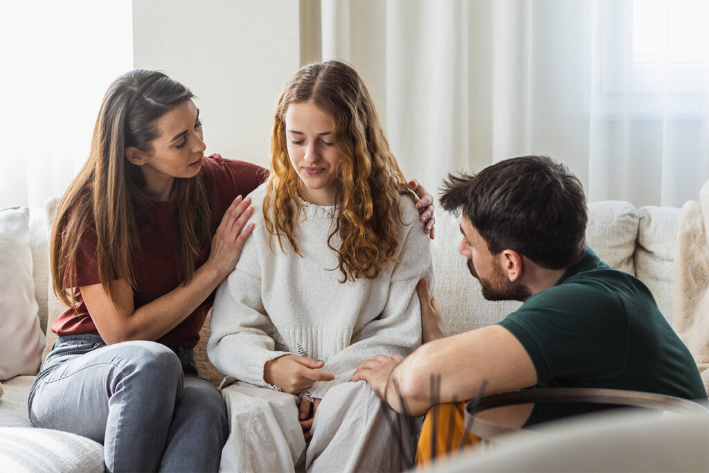 group of teens and adolescents in a group meeting about when and how parents can mandate recovery for a child.